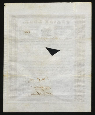 The back has no writing and has a triangle hole cut-out