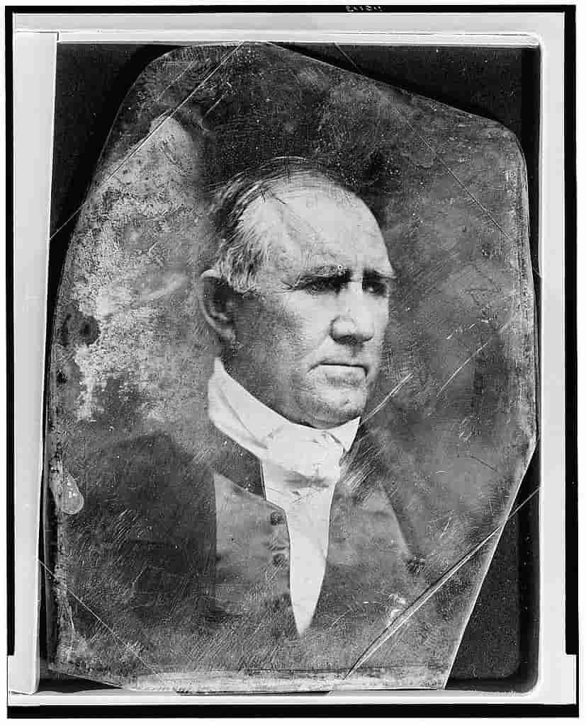 Black and white portrait photograph shows the head and shoulders of Sam Houston